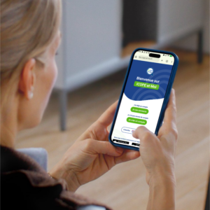 Woman holding a smartphone with the ICOPE & MOI app open